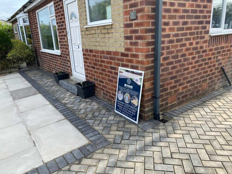 Block paving and porcelain paving at a front door