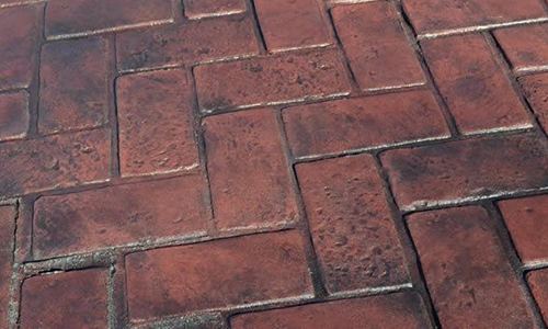 Red brickwork pattern imprinted concrete
