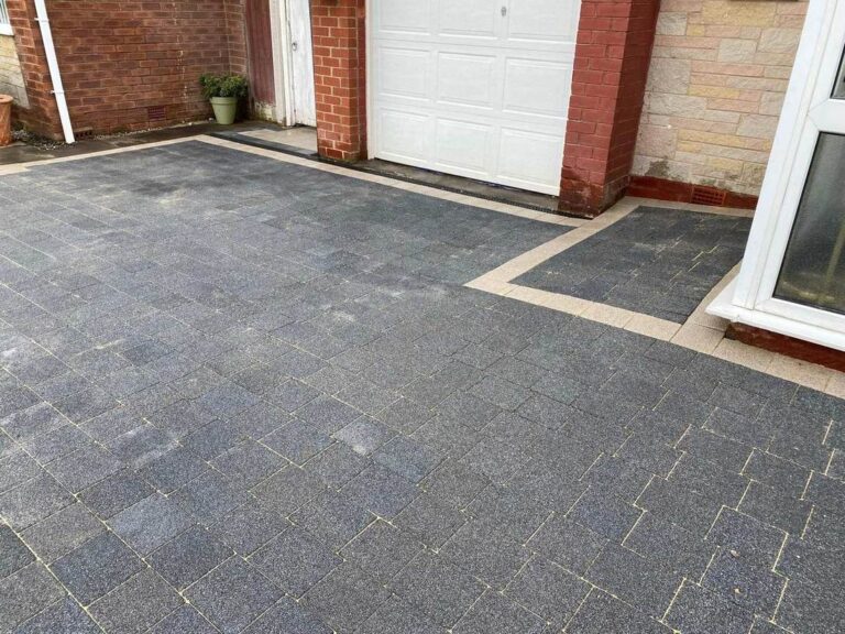 Charcoal paving at the front of a house