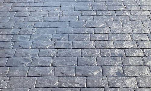 Grey cobblestone pattern imprinted concrete