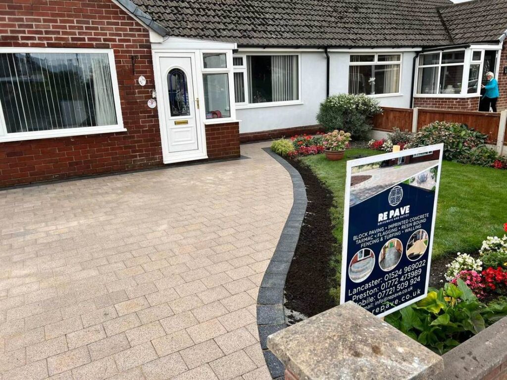 Curved buff block paved driveway at a semi-detached bungalow