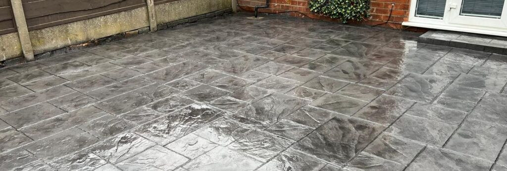 Grey pattern imprinted concrete yard