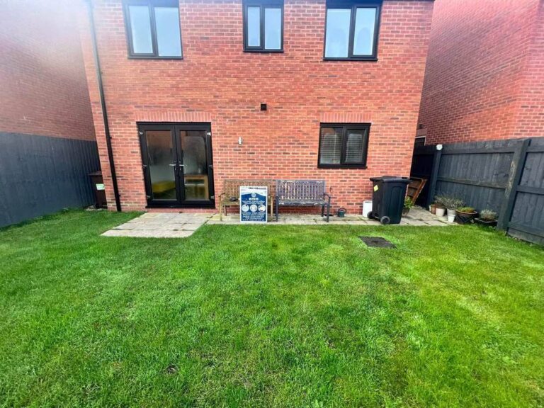 New lawn in the back garden of a new house