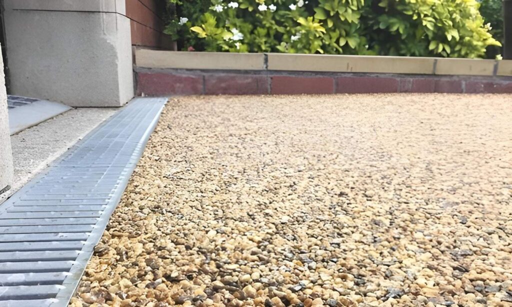 Close-up of resin bound surfacing at a drainage channel