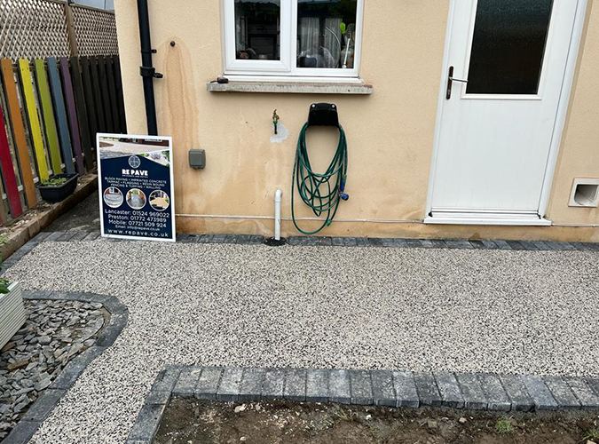 Light resin bound yard at a back door