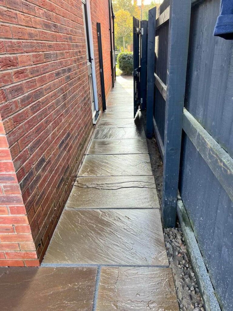 Sandstone path along a narrow side passage