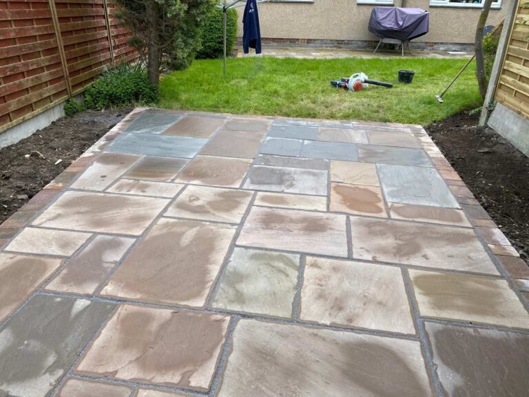 Indian sandstone patio in a back garden