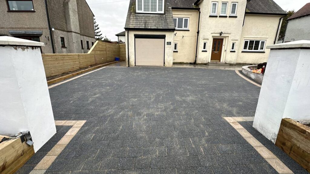 Tarmac driveway with buff block edging