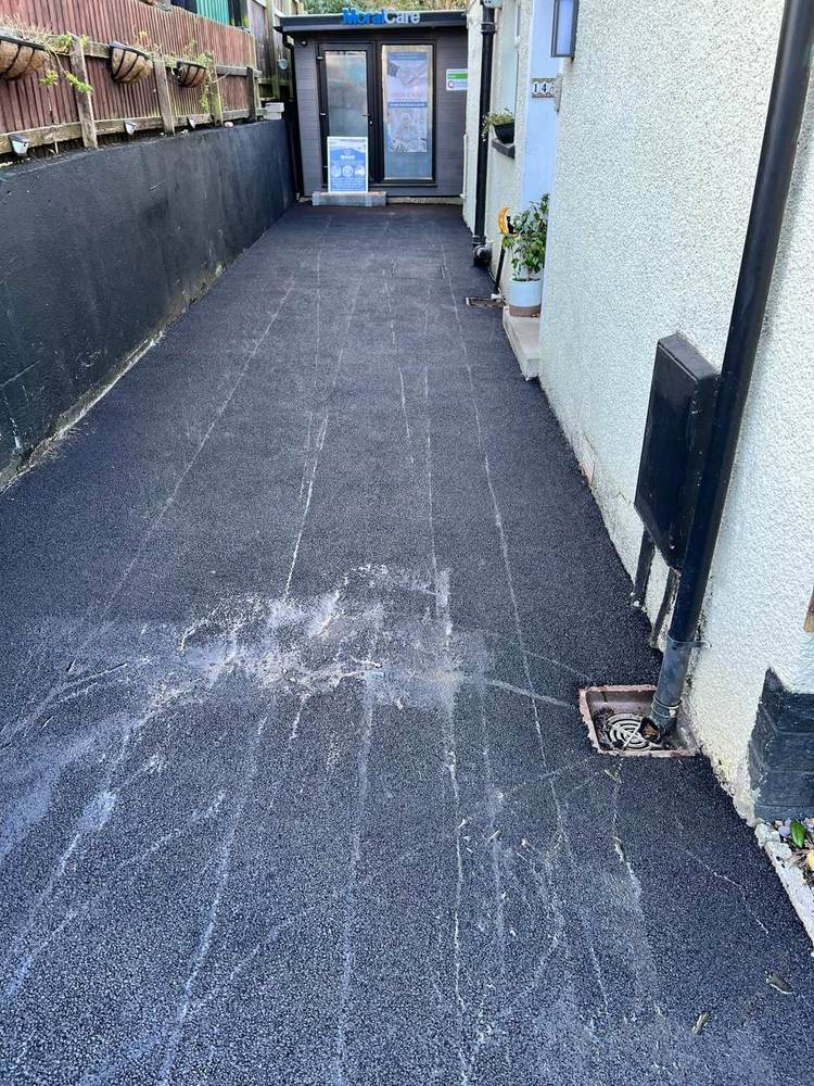 Tarmac path along a side passage